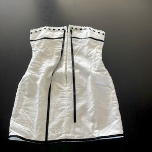 White strapless corset-style dress with embroidered white flowers